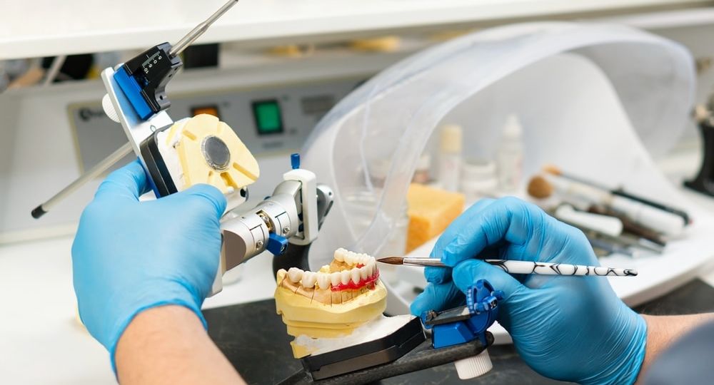 Dental,Prosthesis,Work.,Denture,Work.,Teeth,Painting.,Dental,Technician,Working