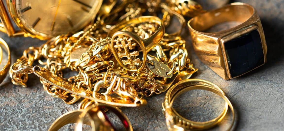 Old and broken jewelry, vintage watches on dark background. Sell