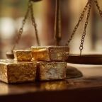 Gold bars on a scale